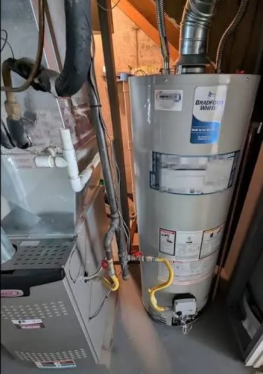 Family-owned Lancaster Water Heater Pros technician servicing a water heater in a Lancaster, PA home