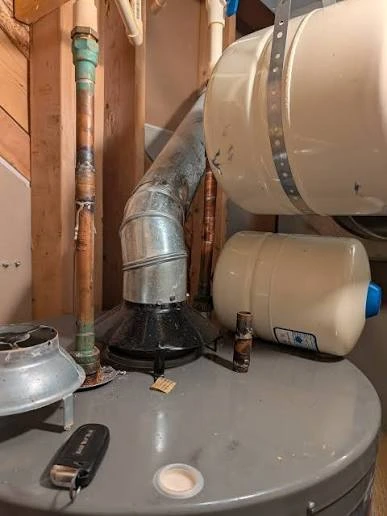 Orphaned gas water heater left alone on an oversized chimney flue in Ephrata, PA